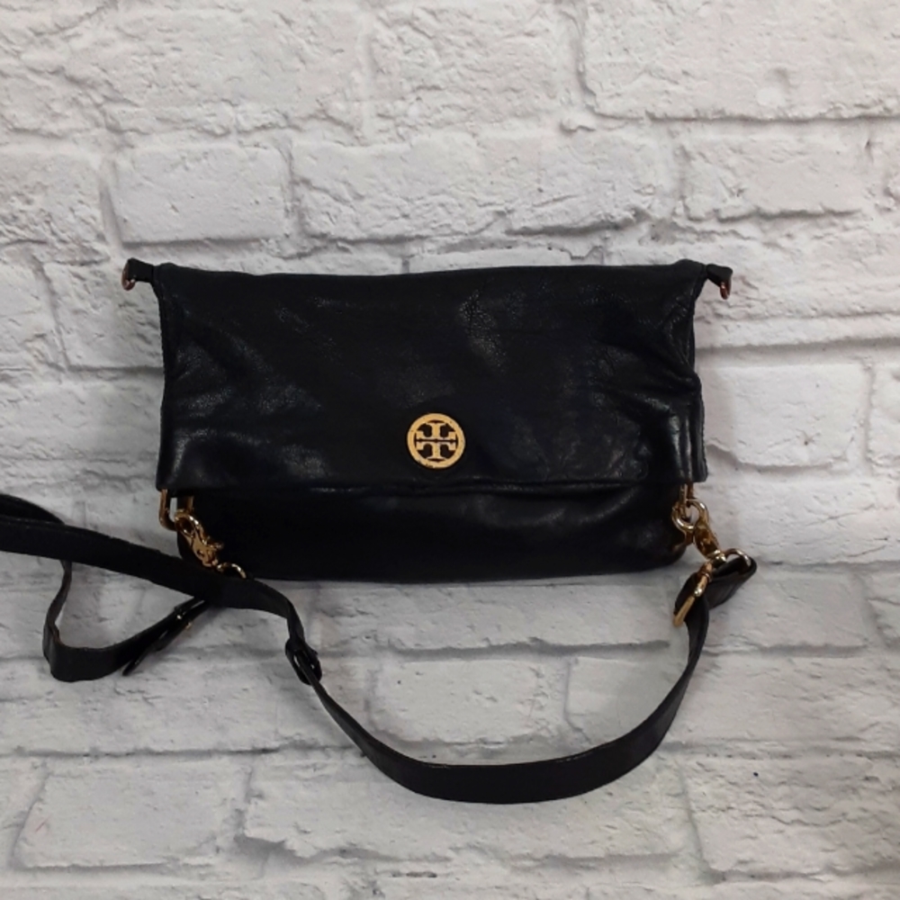 Tory Burch Dena black leather crossbody bag. It’s very used. Hardware is worn
